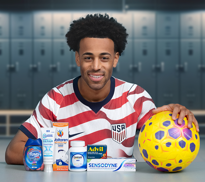 soccer player with a soccer ball and haleon products